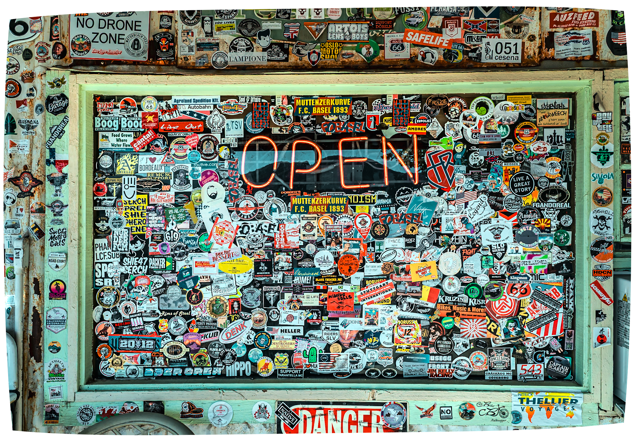 Hackberry General Store sticker wall with OPEN neon &mdash; Stuttgart International, F.C. Basel 1893, Meissen, Bordeaux, Goteborg