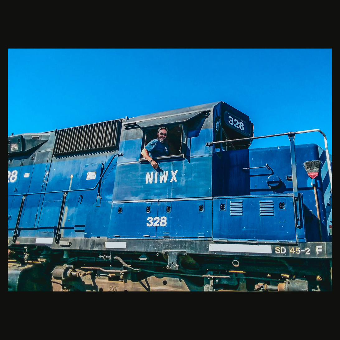 At the throttle of NIWX SD 45-2 No. 328